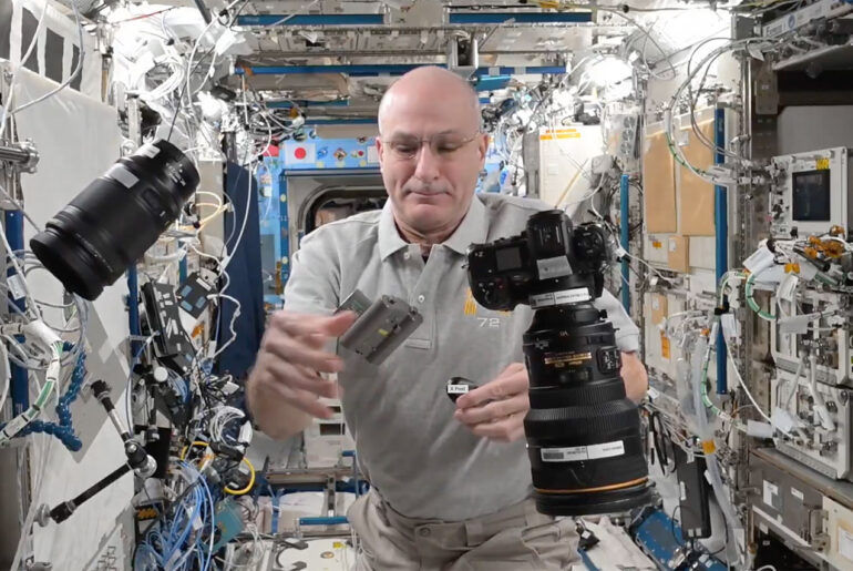 NASA Astronaut Don Pettit Swapping Camera Battery Space