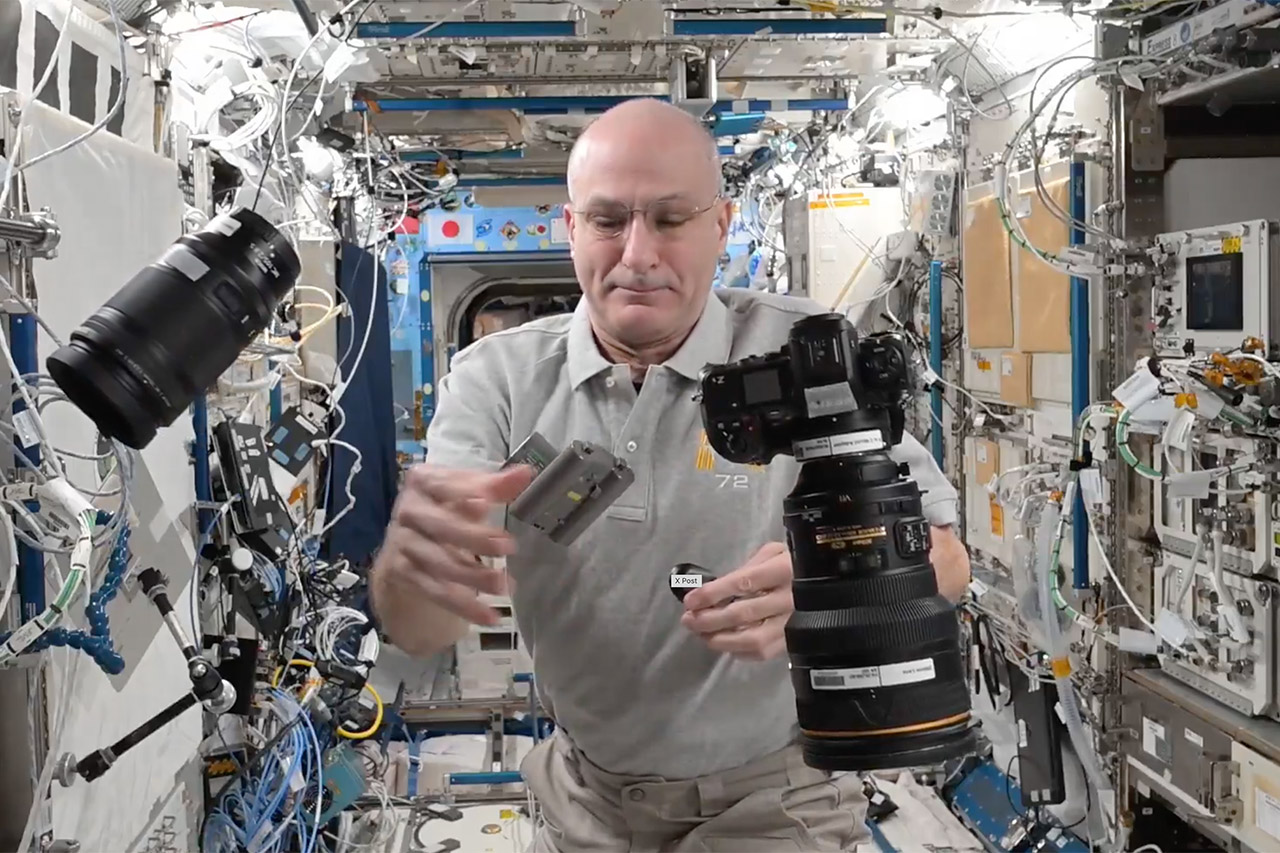 NASA Astronaut Don Pettit Swapping Camera Battery Space