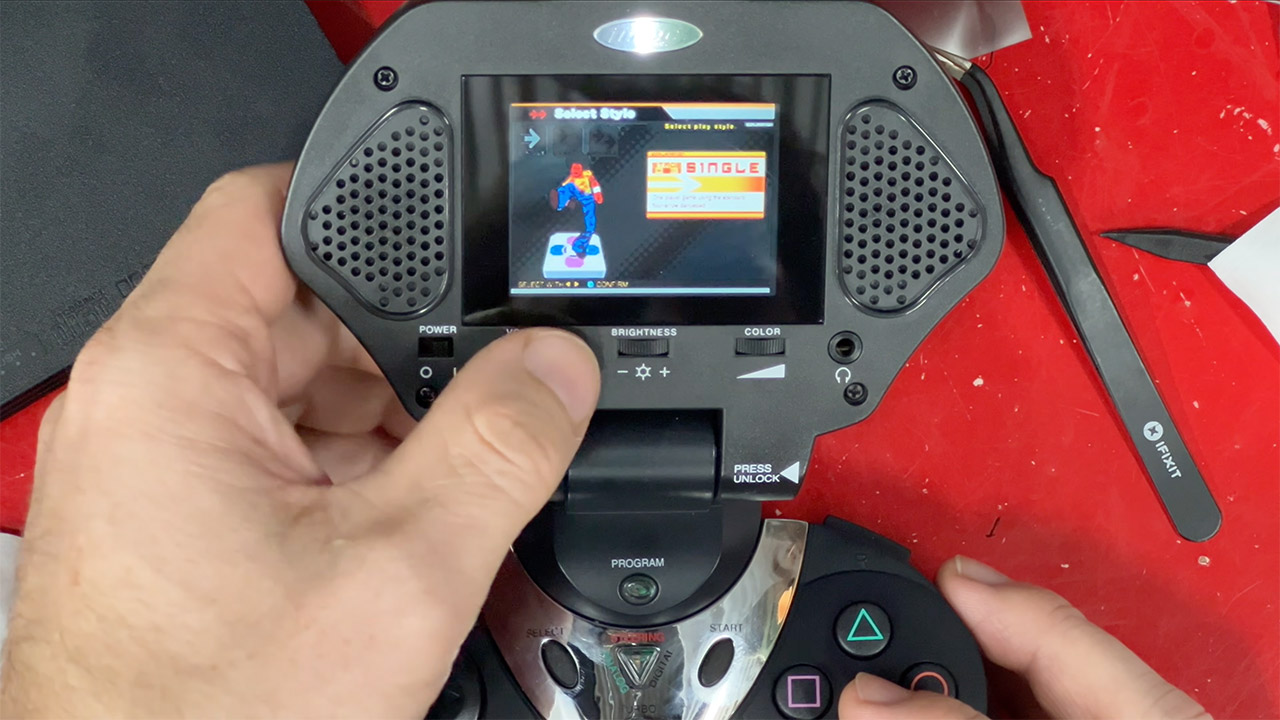 Original PlayStation Portal Intech Controller and Game Screen