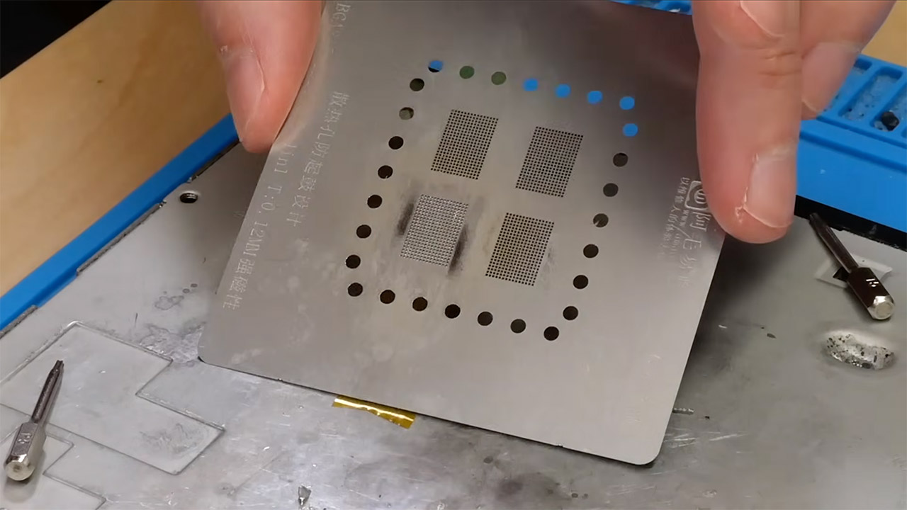 A Daring Chip Swap Provides the MacBook Neo a Full Terabyte of Storage Pulled Straight From an iPhone 1 MacBook Neo 1TB Storage Upgrade iPhone Parts