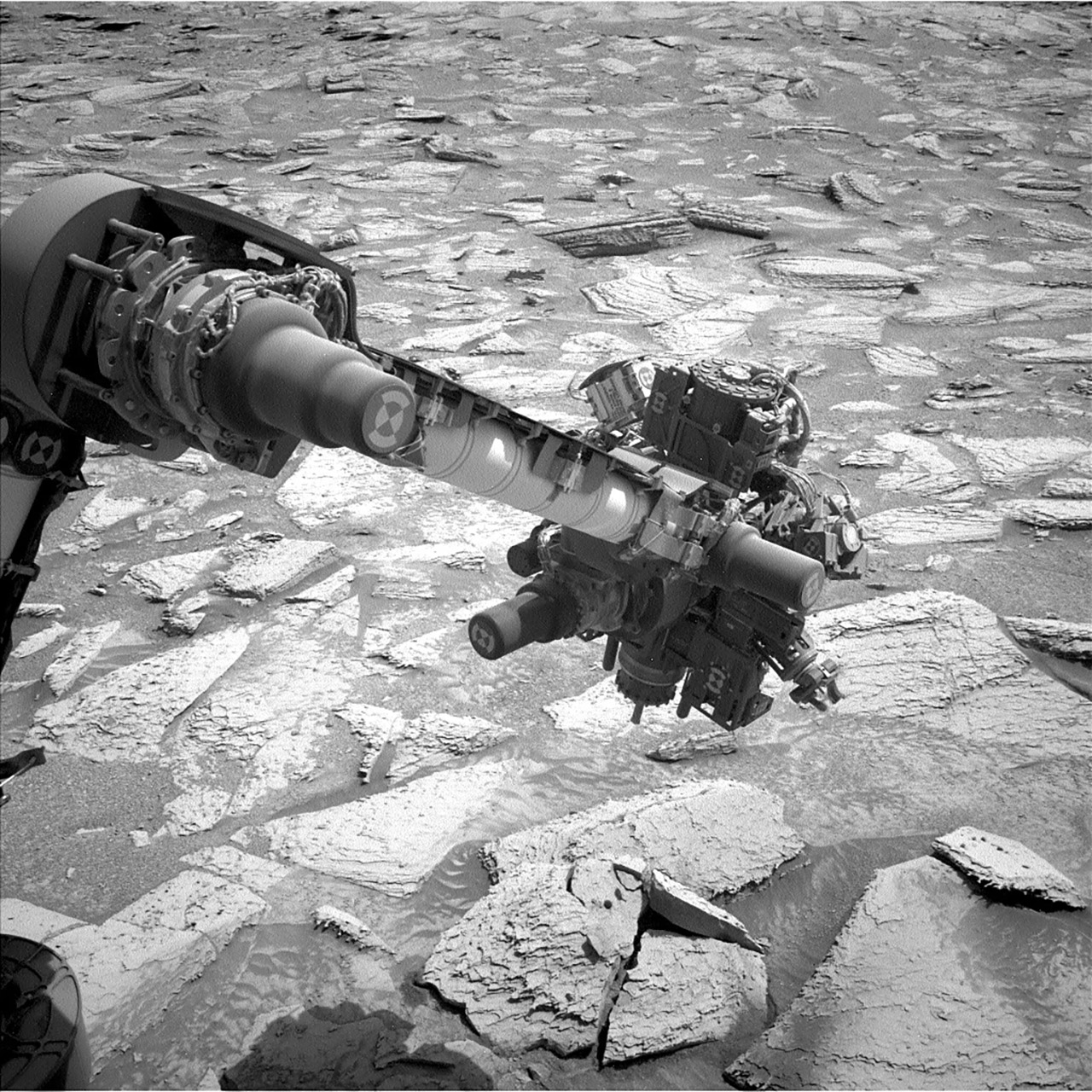 NASA Curiosity Rover Mars Arm Stuck Rock
