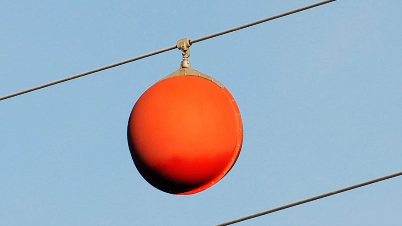 What are the Giant Orange Spheres Power Lines