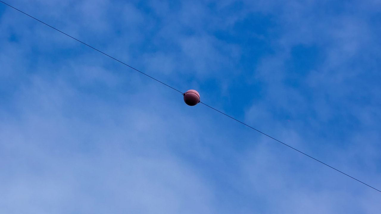 What are the Giant Orange Spheres Power Lines