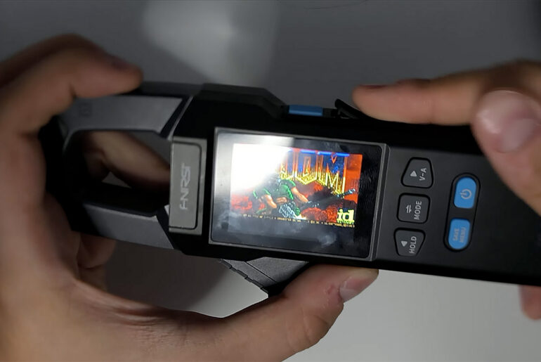 FNIRSI DMC-100 Clamp Meter Running DOOM